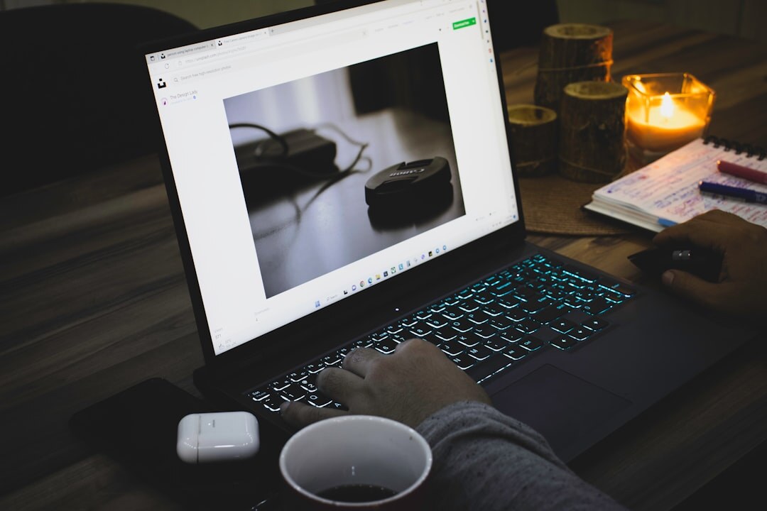 writer at laptop at night